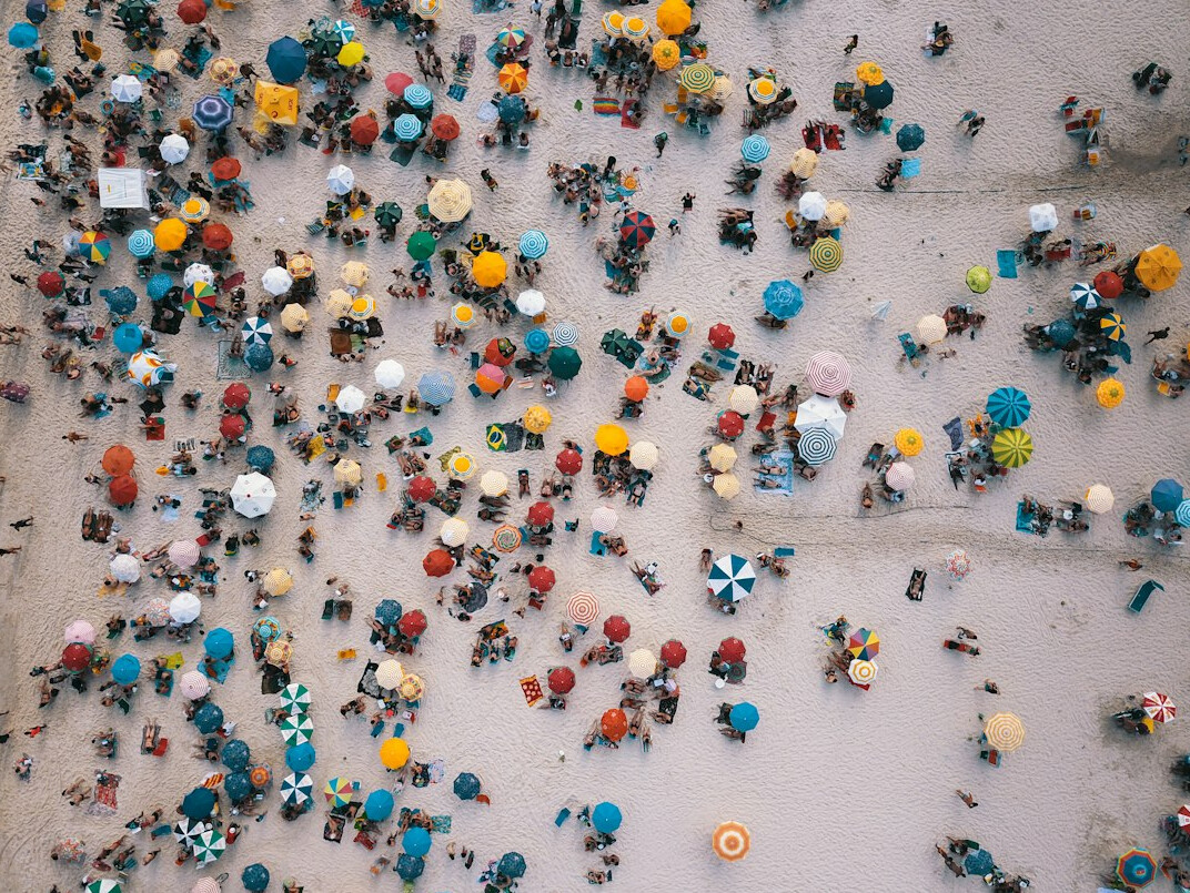 Distant anonymous crowd seen from above in muted tones